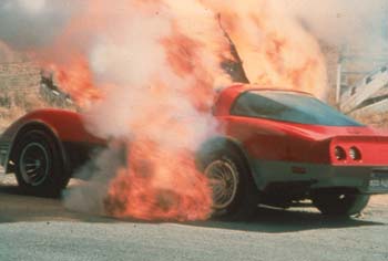 Red Corvette blows up#D6C6E