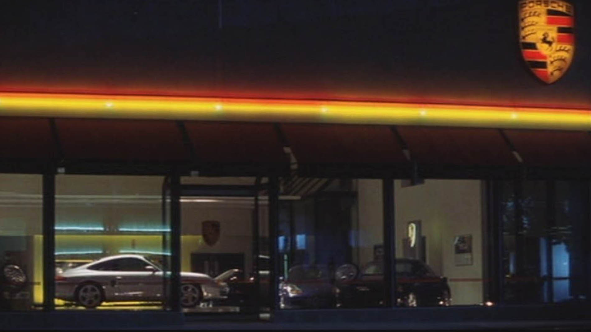 1a. Porshce in dealership no