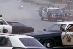 23. Cops racing up and corner Eleanor on Hill