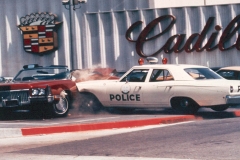 33. Cop smashes into Caddy