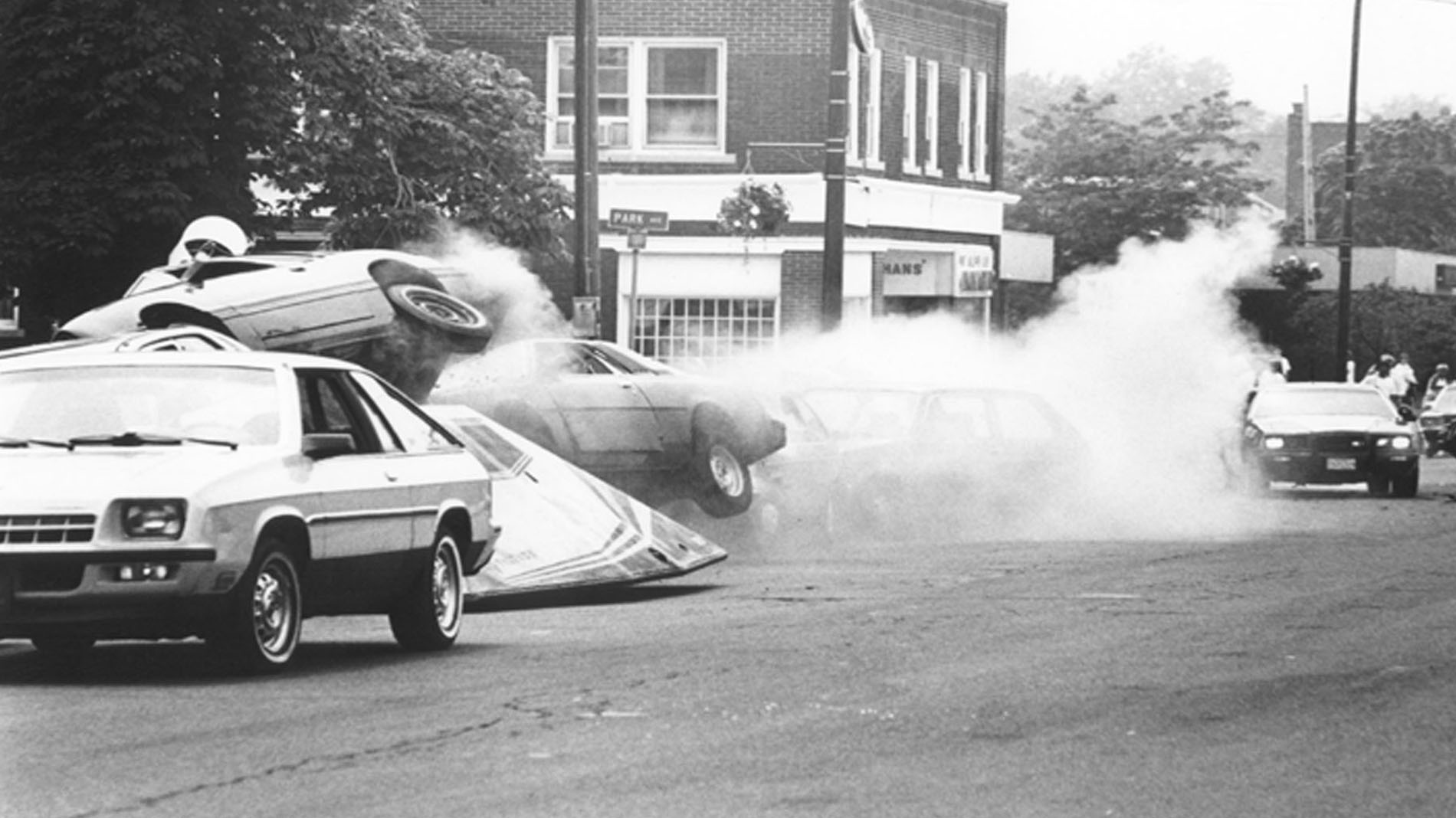 X Slicer flips Car on street