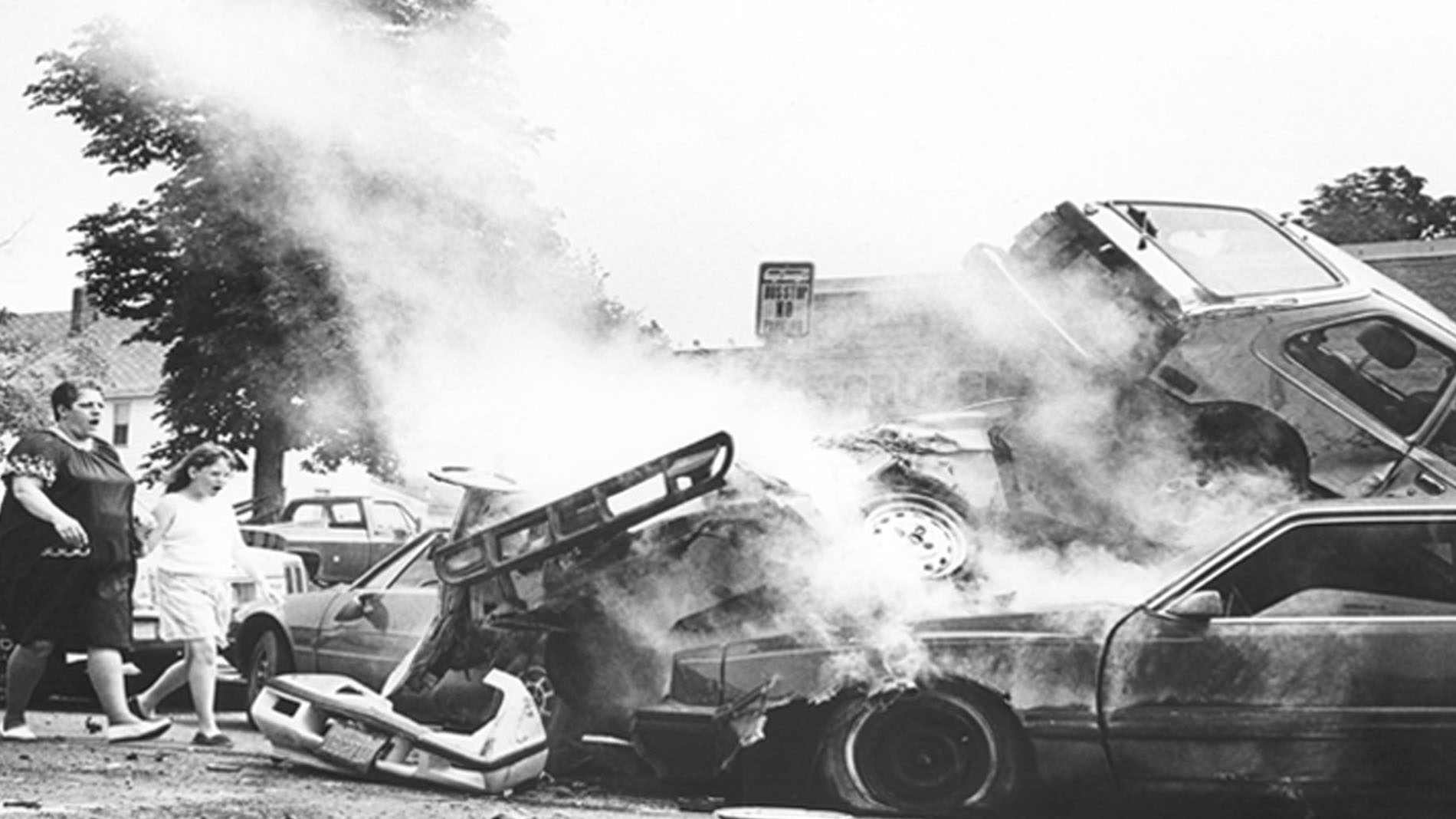 ZA Lady and Girl Look over the wreckage