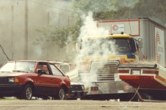 J Semi Truck plows throw cars