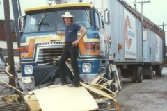 L Toby stand over Demolished Yellow car