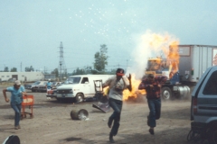 M Lot workers run from the speeding Semi